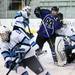 Pioneer senior Louis Marr is checked near the Livonia Stevenson goalie on Tuesday, March 5. Daniel Brenner I AnnArbor.com
